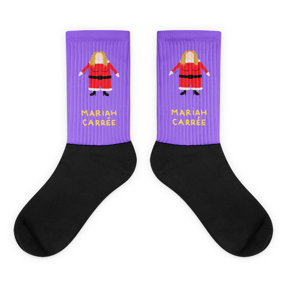 All I want for Christmas is ... cette paire de chaussettes !

Cette année pour Noël, on sort des sentiers battus, on casse les codes, changeons des traditionnelles boules de Noël et mettons à nos pieds Mariah Carrée. Peut également servir de réceptacle à cadeau pour ceux qui aiment recevoir leurs cadeaux dans une chaussette, mais sa capacité n'est pas extensible, on préfère prévenir.