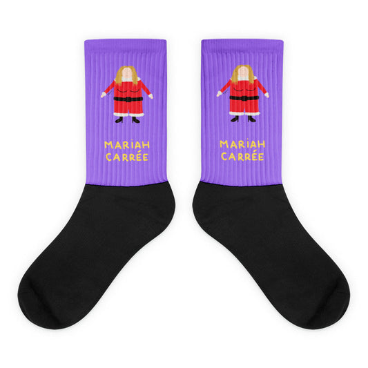 All I want for Christmas is ... cette paire de chaussettes !

Cette année pour Noël, on sort des sentiers battus, on casse les codes, changeons des traditionnelles boules de Noël et mettons à nos pieds Mariah Carrée. Peut également servir de réceptacle à cadeau pour ceux qui aiment recevoir leurs cadeaux dans une chaussette, mais sa capacité n'est pas extensible, on préfère prévenir.