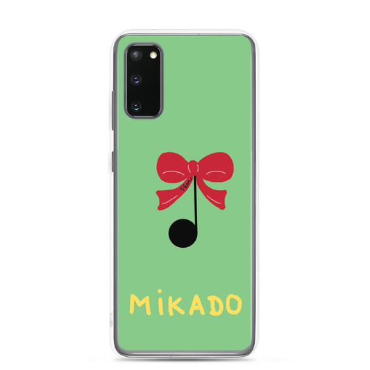 Coque de téléphone vert avec une illustration centrale d'une note de musique noire portant un nœud rouge, accompagnée de l'inscription "MIKADO" en lettres jaunes.